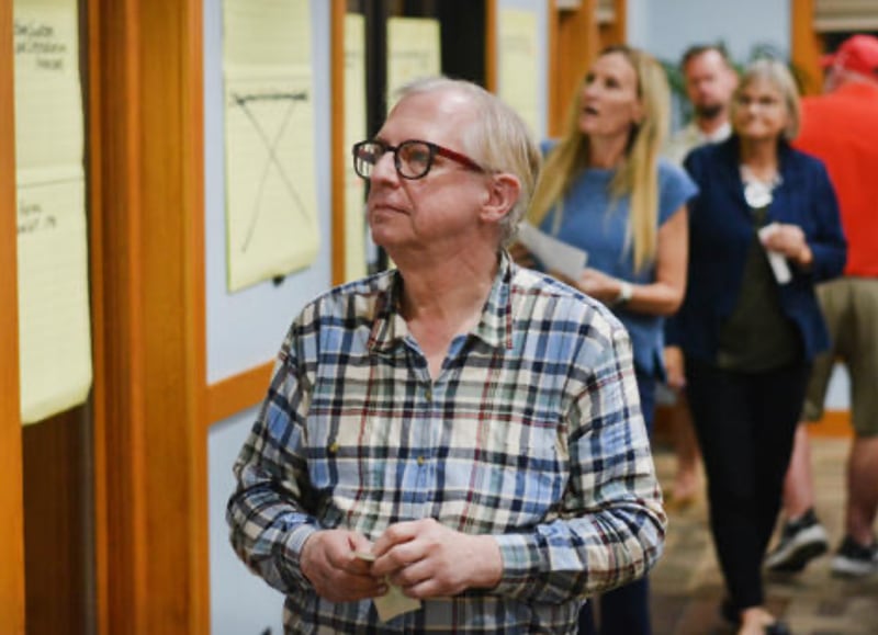 Mark Hallam of the Newton City Council inspects the available goals to select at a past goal setting session held at the Krumm Center.