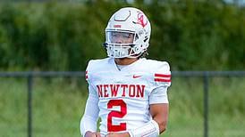 Comets clip Cards with late touchdown