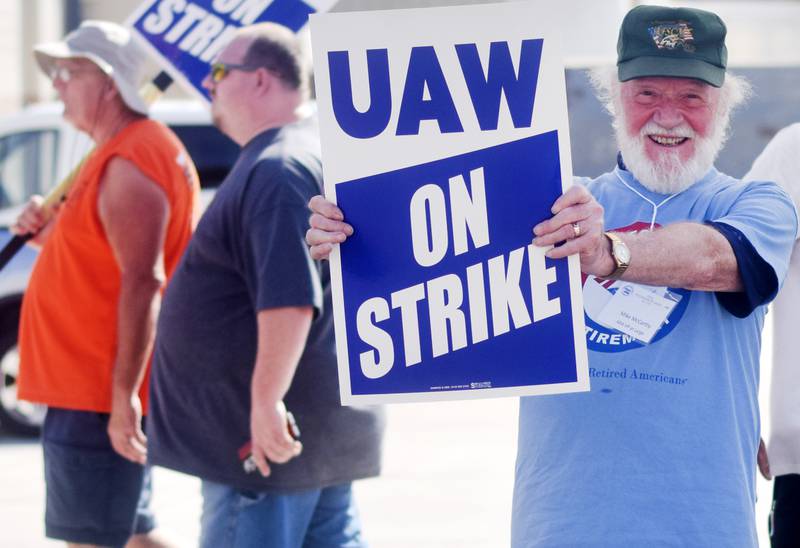 Thombert, Inc. employees and members of the United Auto Workers Local 997 union were supported by fellow union members from across the state on Aug. 25 outside the picket line of the manufacturing company's Newton property.