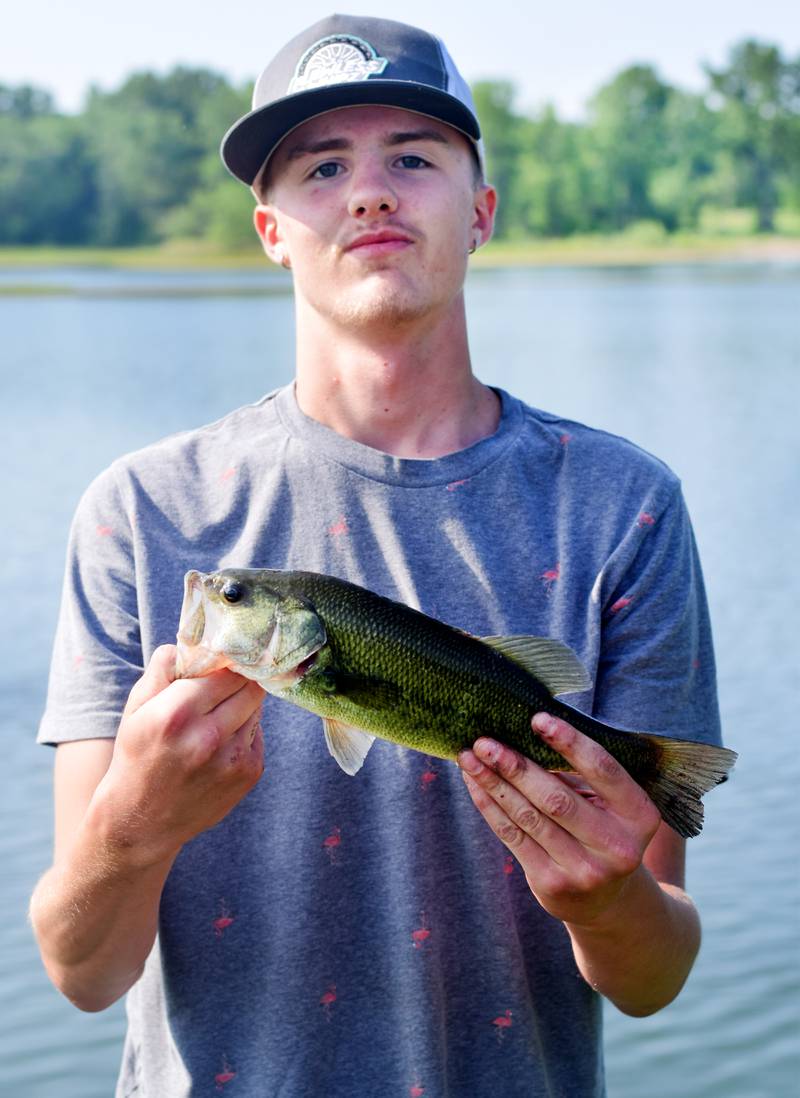 Young anglers catch bluegills and bass (and sometimes softshell turtles) during the Youth Fishing Derby on June 3 at Quarry Springs in Colfax.