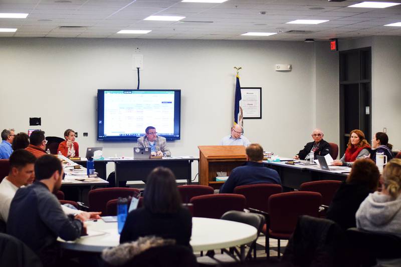The Newton Community School District Board of Education discusses master planning options at the Dec. 11 meeting at E.J.H. Beard Administration Center. The school board was able to remove three out of seven possible options it is considering.
