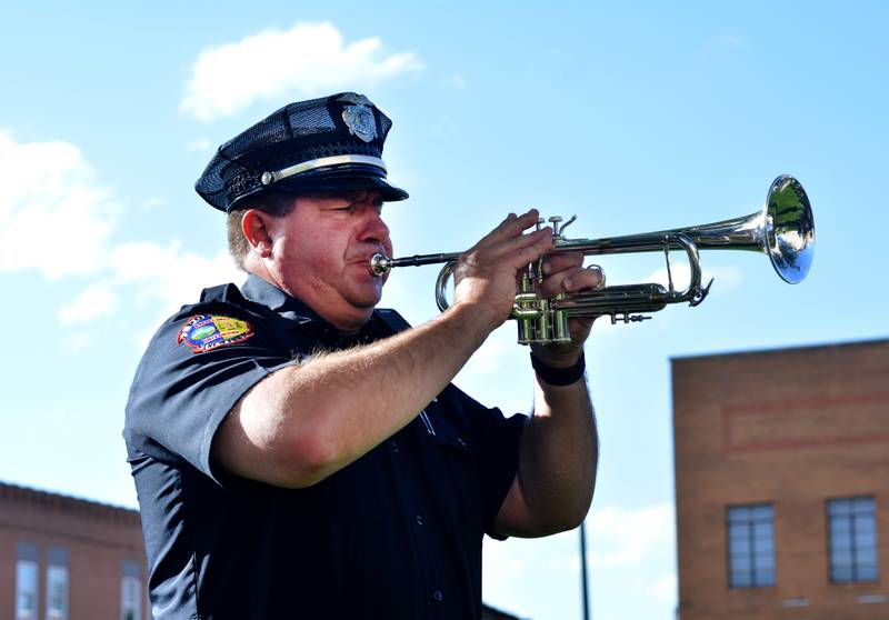 Local law enforcement participate in the National Police Week Ceremony on May 15 at the Jasper County Courthouse in Newton. Community members attended the event to honor the six officers who had made the ultimate sacrifice.