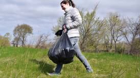 ‘YOUR TRASH IS OUR FUEL’: REG Newton employees lead Earth Day-inspired cleanup at city parks