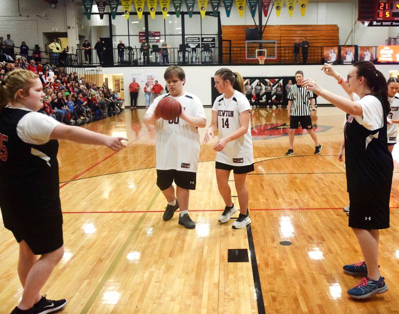 Cameron Muhs handles the ball during The Big Game on April 19 at Newton High School.