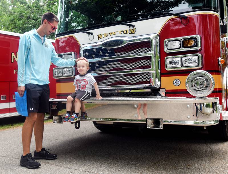 Local first responders show off emergency vehicles and have kids participate in an obstacle course as part of Safety Fest during Newton Fest on Saturday, June 10 at Maytag Park.