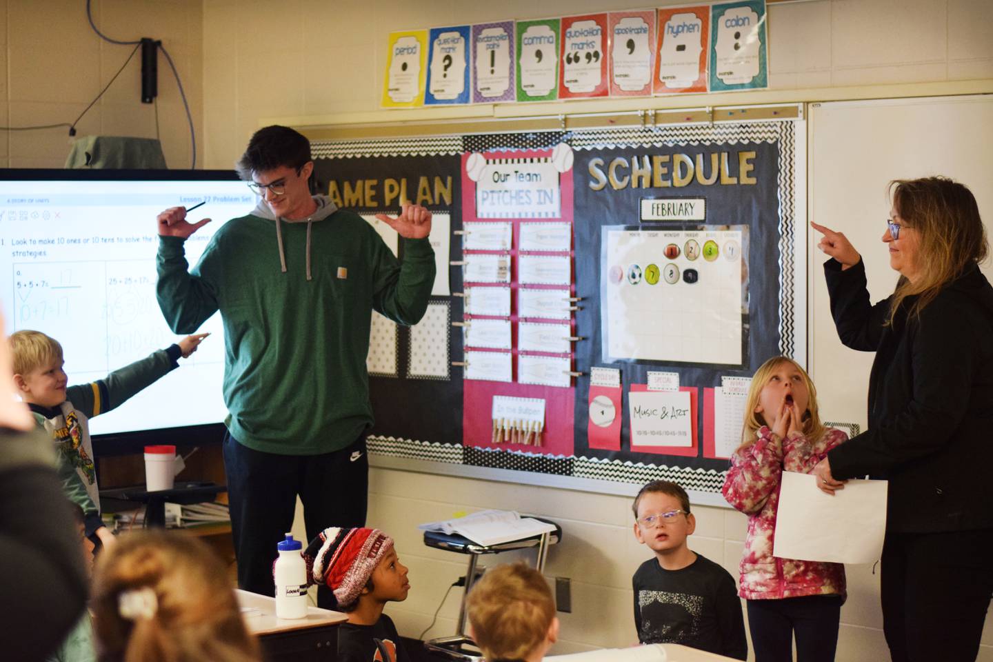 Trey Vanderlaan, a second grade teacher at Emerson Hough Elementary, on Feb. 9 learns he is the recipient of the Newton Community Educational Foundation's Excellence in Education Award.
