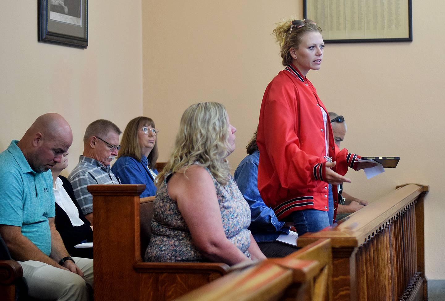 Ashley McLaughlin, a horse trainer who works at K & H Ranch, speaks against the rezoning of agricultural land to rural residential during the Jasper County Board of Supervisors meeting on Oct. 3 in Newton.