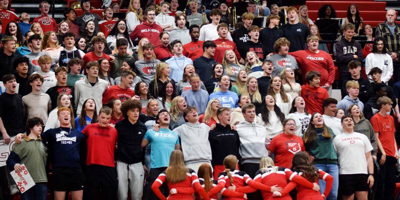 The Newton Cardinals student section cheers on their peers during The Big Game on April 19 at Newton High School.