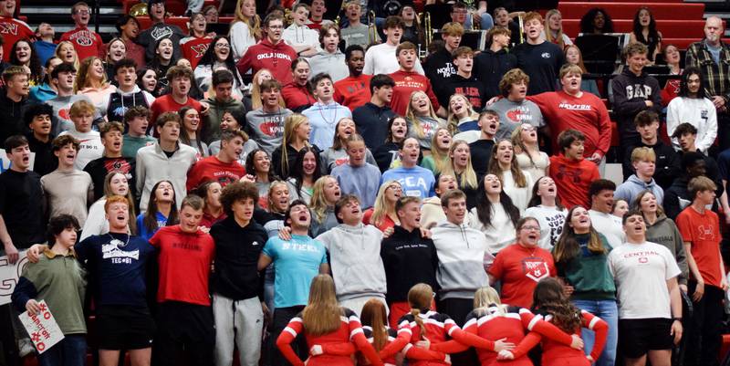The Newton Cardinals student section cheers on their peers during The Big Game on April 19 at Newton High School.
