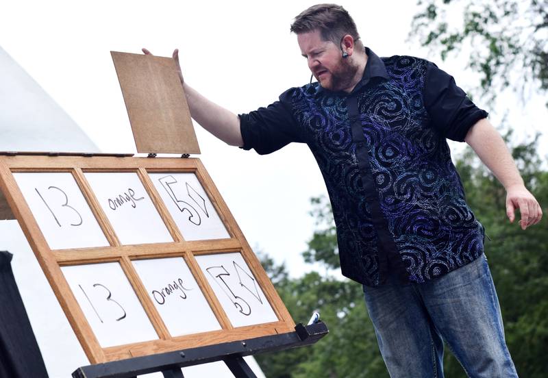 Eric Michaels performs magic and illusions during Newton Fest on Saturday, June 10 at Maytag Park.