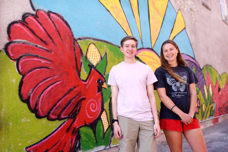 From left: Leo Friedman and Marin Pettigrew turned heads at a recent scholarship ceremony after the two seniors of Newton High School wore T-shirts opposing the governor’s school choice and education bills. The interaction, which was streamed live, went viral on social media.