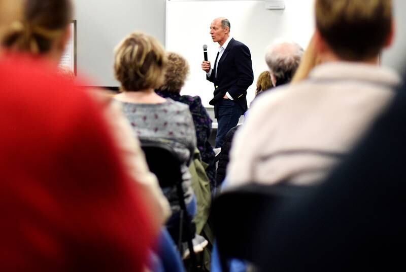 Mike Franken, a retired Navy admiral and Democrat running for U.S. Senate, speaks to a room of 50 people May 24 at the E.J.H. Beard Administration Center in Newton.