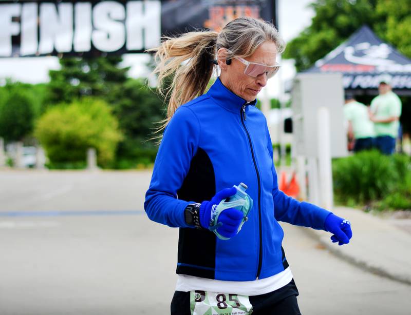 Runners participate in The Phoenix Phase Initiative's fifth annual Run For Her Life 5K and Half-Marathon on May 17 at Legacy Plaza in Newton. More than 110 people showed up for the run.