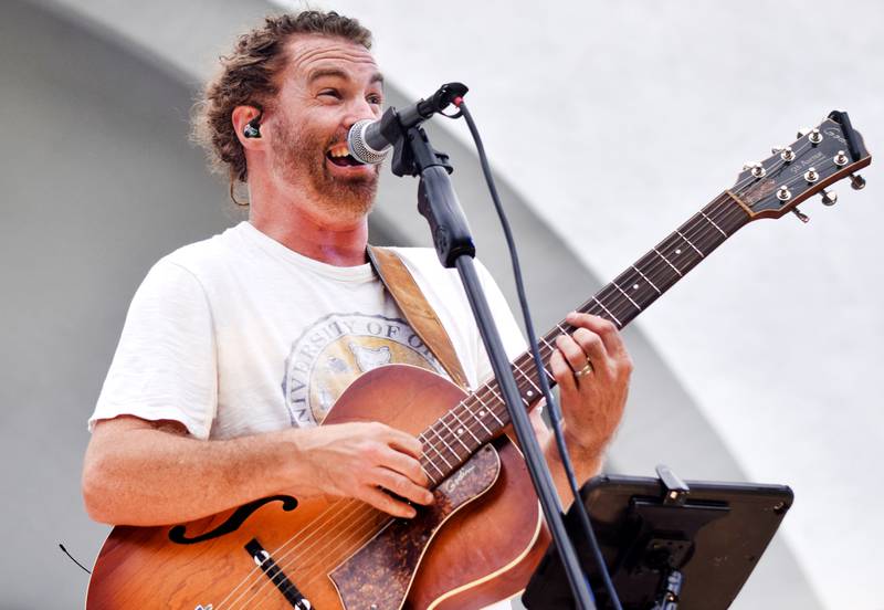 Damon Dotson, a Des Moines-based musician, performs the Maytag Bowl during the last night of Newton Fest on Saturday, June 10 at Maytag Park.