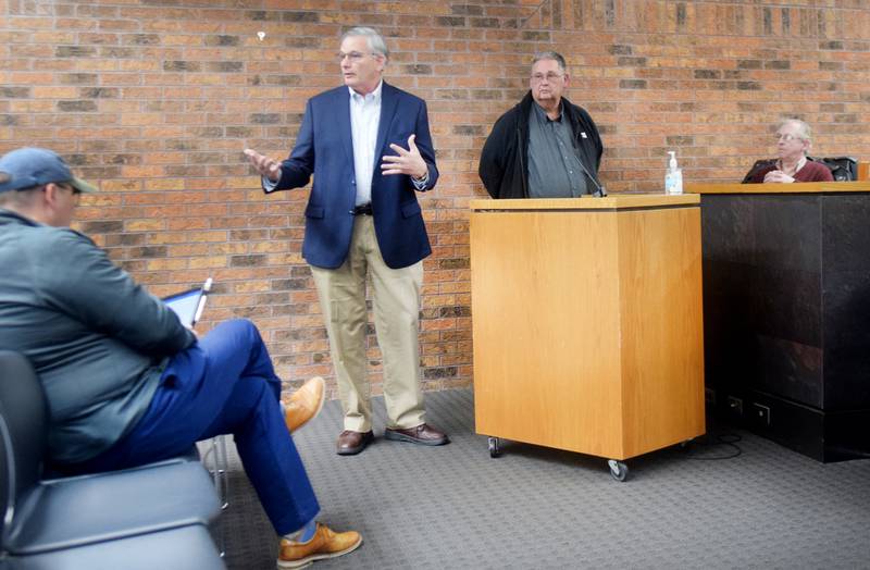 Jim Boyd, director of strategic growth for Optimist International, speaks alongside former Optimist governor of the Iowa district Richard May during a presentation on April 17 at the Newton City Council meeting in city hall.