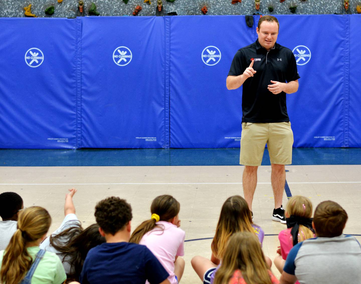 Cole Custer, a professional NASCAR driver, speaks with third-grade students on May 15 at Thomas Jefferson Elementary School.
