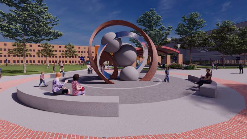 Renderings of the Legacy Plaza greenspace show off a large sculpture in the center of a gathering place that connects a number of paths in and around the campus. DMACC has launched a public initiative to complete the fundraising for the greenspace, which many have called the centerpiece of the Legacy Plaza project.