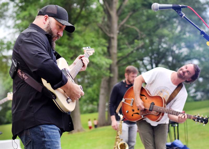Damon Dotson, a Des Moines-based musician, performs the Maytag Bowl during the last night of Newton Fest on Saturday, June 10 at Maytag Park.