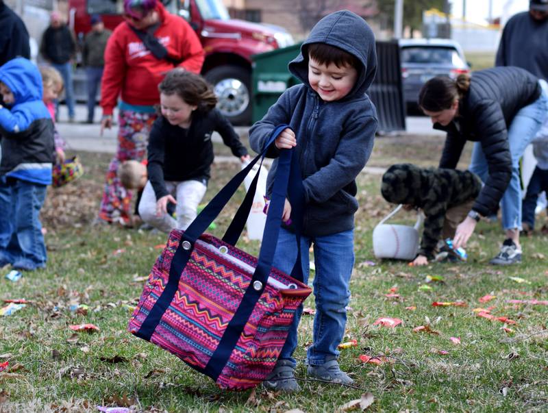Children participate in the candy throw during the Spring Celebration on April 2 at the Prairie City Community Building.