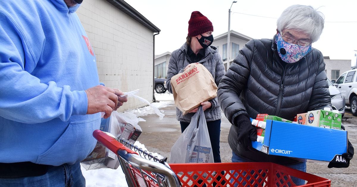 DUTIFUL DONATIONS Local Democrats donate food to Newton