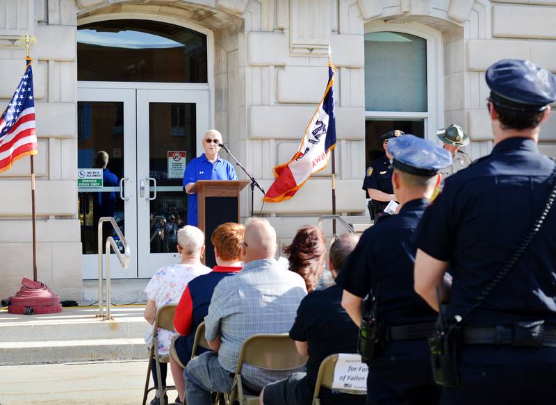 Local law enforcement participate in the National Police Week Ceremony on May 15 at the Jasper County Courthouse in Newton. Community members attended the event to honor the six officers who had made the ultimate sacrifice.