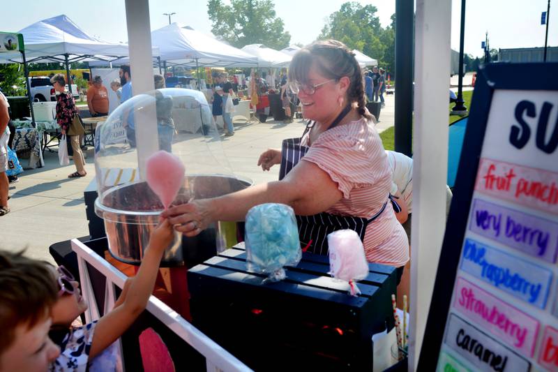 Newton Farmers Market moved from its downtown location to the greenspace of Legacy Plaza this year. The market, which is held 4-6 p.m. every Tuesday, saw hundreds of people attend. Organizers said 34 vendors participated in the market this year, the most the Newton Farmers Market has ever seen.