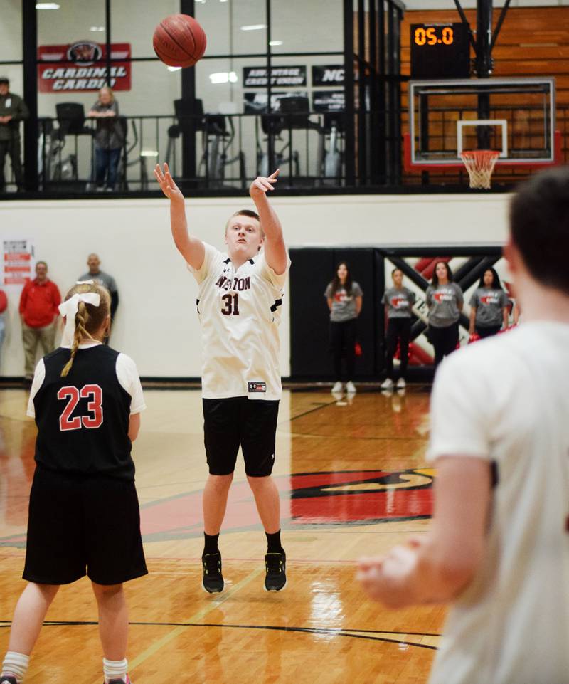Alex Church shoots a three-pointer during The Big Game on April 19 at Newton High School.