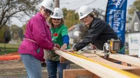 Vernon volunteers join Habitat for Humanity to build Newton home