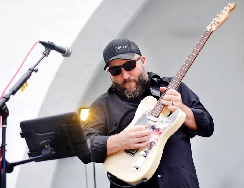 Damon Dotson, a Des Moines-based musician, performs the Maytag Bowl during the last night of Newton Fest on Saturday, June 10 at Maytag Park.