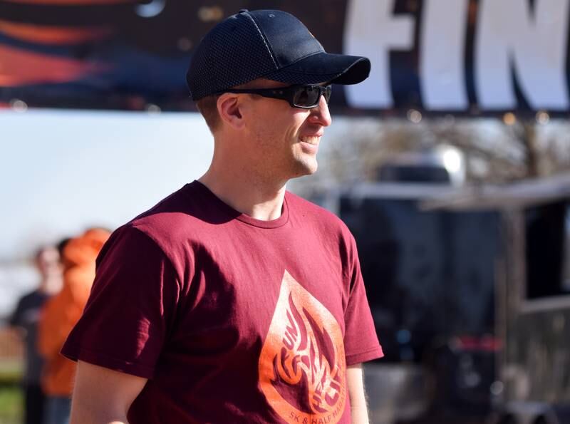 Runners, walkers and young bikers take off for the Run For Her Life 5K organized by nonprofit Phoenix Phase Initiative on April 29 at Legacy Plaza in Newton.