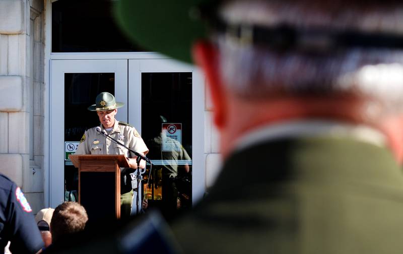 Local law enforcement participate in the National Police Week Ceremony on May 15 at the Jasper County Courthouse in Newton. Community members attended the event to honor the six officers who had made the ultimate sacrifice.