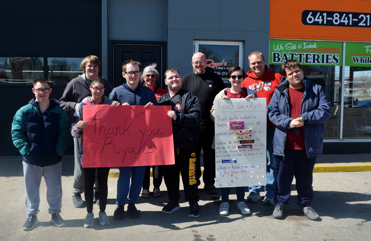 Ryan Dannen of Ryan's Tire & Auto donated $3,000 to go towards new T-shirts for the players participating in The Big Game, which is an annual basketball game featuring the extended core physical education class.