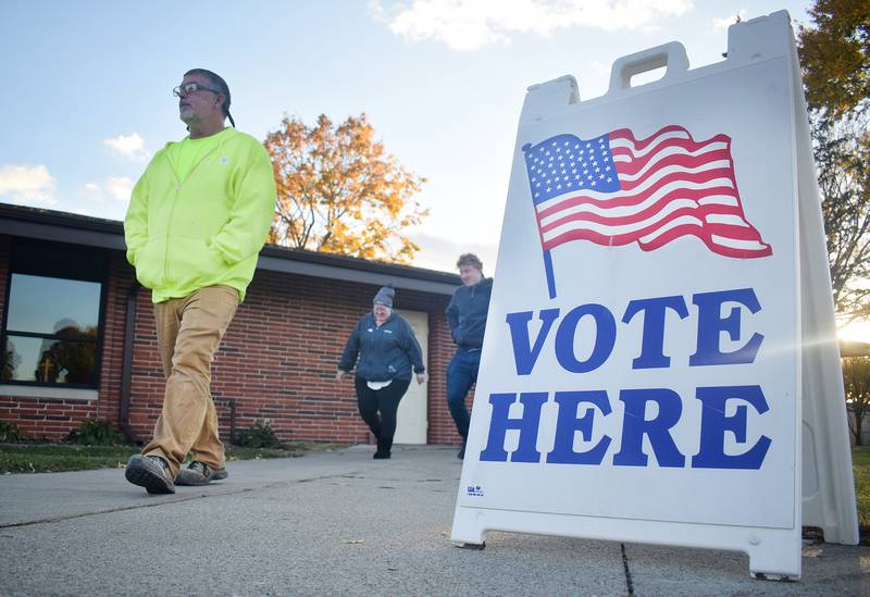 Voters leave the precinct at St. Luke United Methodist Church on Election Day Nov. 2, 2021, in Newton.