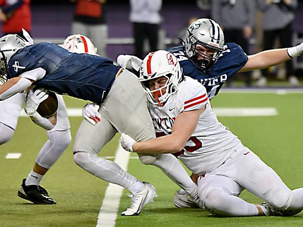 Second-half rally helps top-ranked Xavier sneak past Newton football in 4A thriller