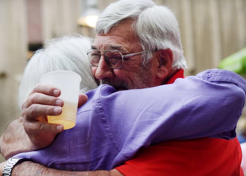 Newton High School graduates gather for drinks and camaraderie at the all-class reunion June 7 at Legacy Plaza. Newton Alumni Weekend brought back Cardinals for a weekend of partying and fellowship.