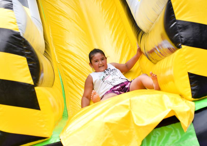 Kids enjoy all the games and activities available in the Fun Zone of Newton Fest on Saturday, June 10 at Maytag Park.