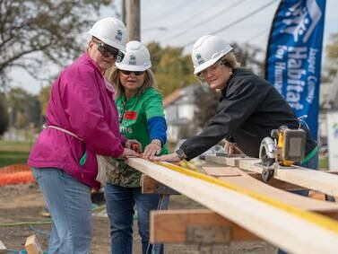 Vernon volunteers join Habitat for Humanity to build Newton home