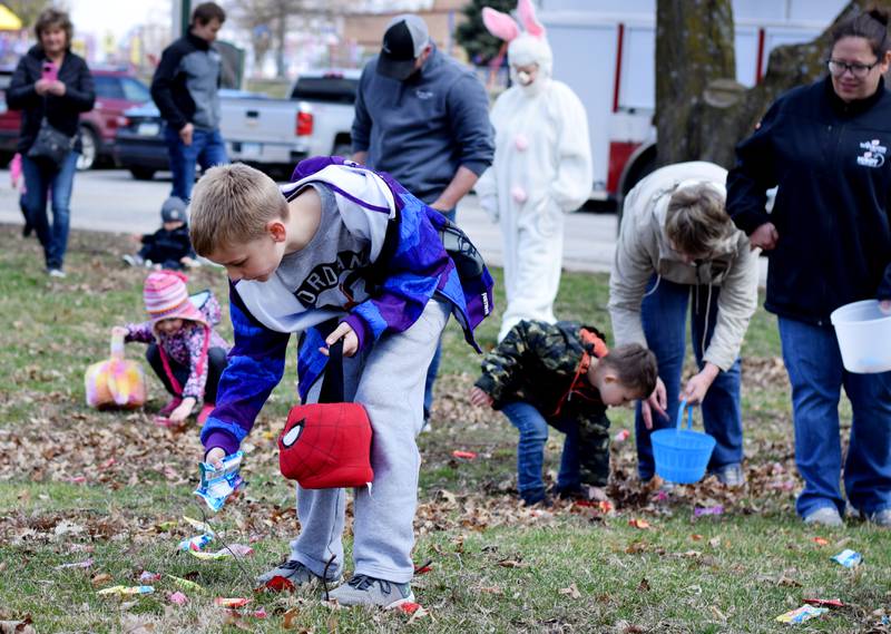 Children participate in the candy throw during the Spring Celebration on April 2 at the Prairie City Community Building.