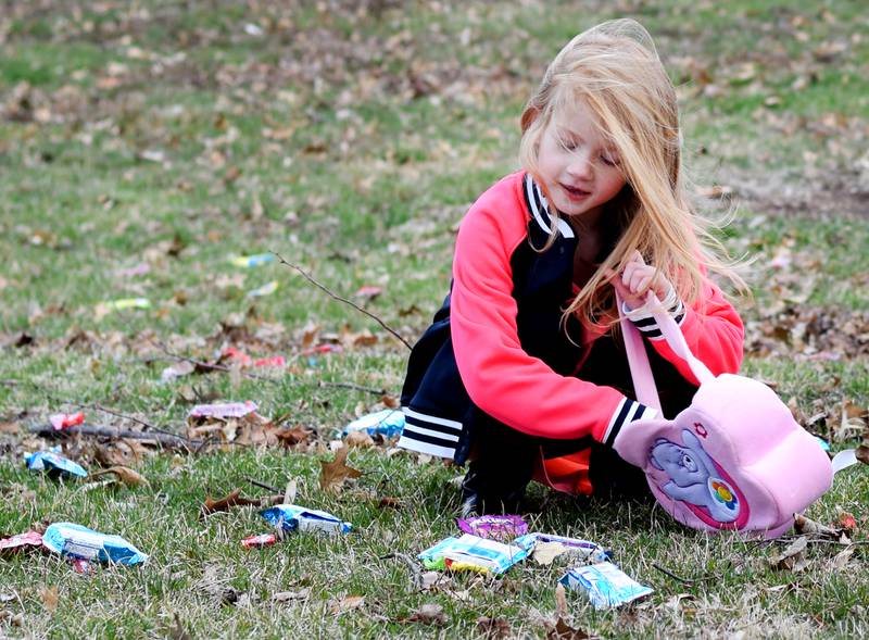 Children participate in the candy throw during the Spring Celebration on April 2 at the Prairie City Community Building.