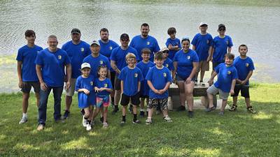 Young anglers and their police partners hook big fish at Cops and Bobbers