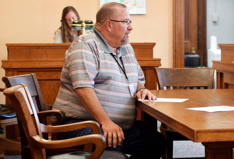 Jasper County Treasurer Doug Bishop speaks with the board of supervisors about the calls his office staff have received about property tax statements.