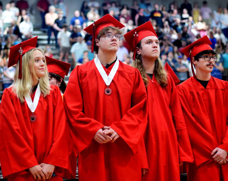 The Newton High School Class of 2024 seniors walk the stage during commencement on May 19 inside the high school gymnasium.