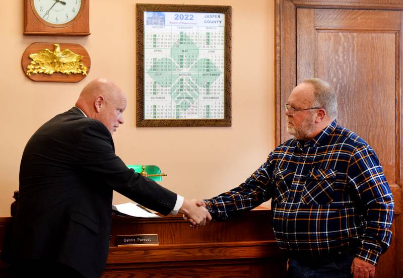 Former supervisor Denny Stevenson, right, is appointed to the Jasper County Board of Supervisors on Dec. 27 by Iowa District Court Judge Michael Jacobsen. Stevenson was appointed to the seat previously filled by Denny Carpenter, who died before he could be sworn in for his fifth term in office.