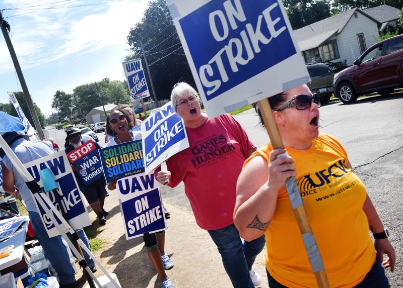 Thombert, Inc. employees and members of the United Auto Workers Local 997 union were supported by fellow union members from across the state on Aug. 25 outside the picket line of the manufacturing company's Newton property.
