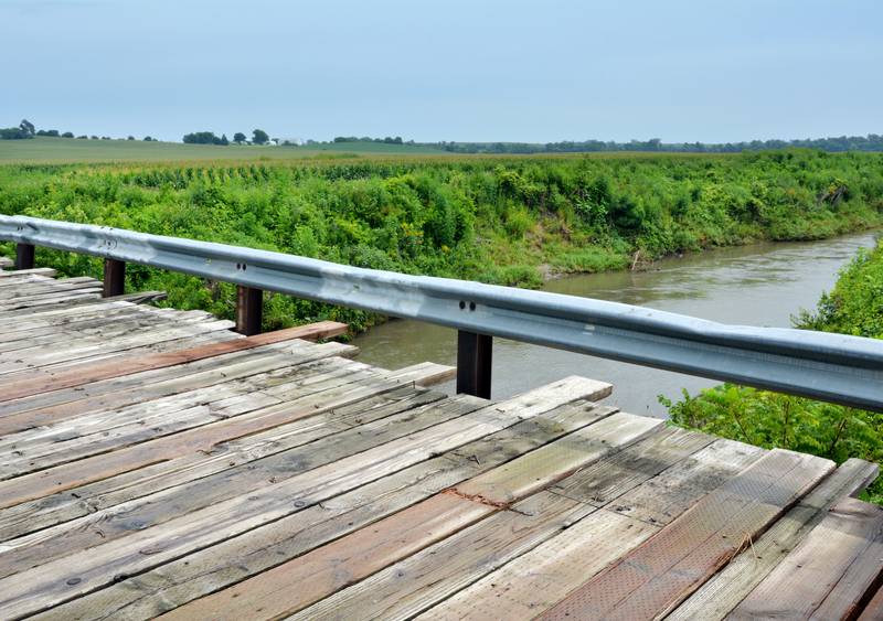 Neighbors disagree with Jasper County's proposal to remove the bridge along Iowa Street, which they argue is the only other entryway and exit to their neighborhood.
