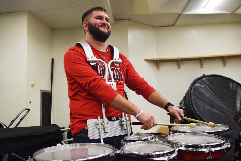 Newton alumni and students have a jam session on Dec. 16 in the band room of Newton High School. Current and past members of the Newton High School band on Dec. 16 participated in the inaugural Alumni Pep Band Night. Adam Kallal, the band director at Newton High School, organized the event in hopes it would become an annual celebration.