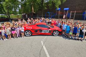 Kids enrolled in YMCA camp complete STEM activities for NASCAR field day