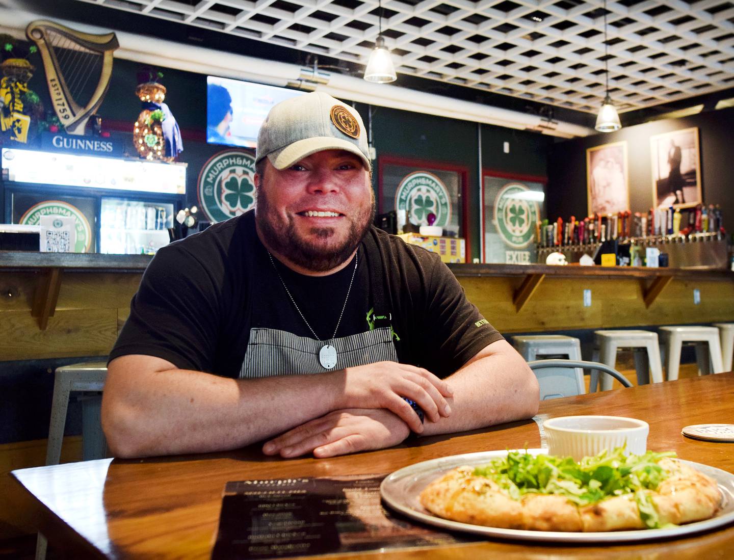 Conor Fudge, owner of Murph & Mary's Pub, this past week launched a pizza menu at the Newton bar. The pizza is made from a cold fermented dough that Fudge spent years perfecting with his friends. Customers came to Murph & Mary's in droves to try the new creation, which is something Fudge had been wanting to add ever since he opened in March 2023.