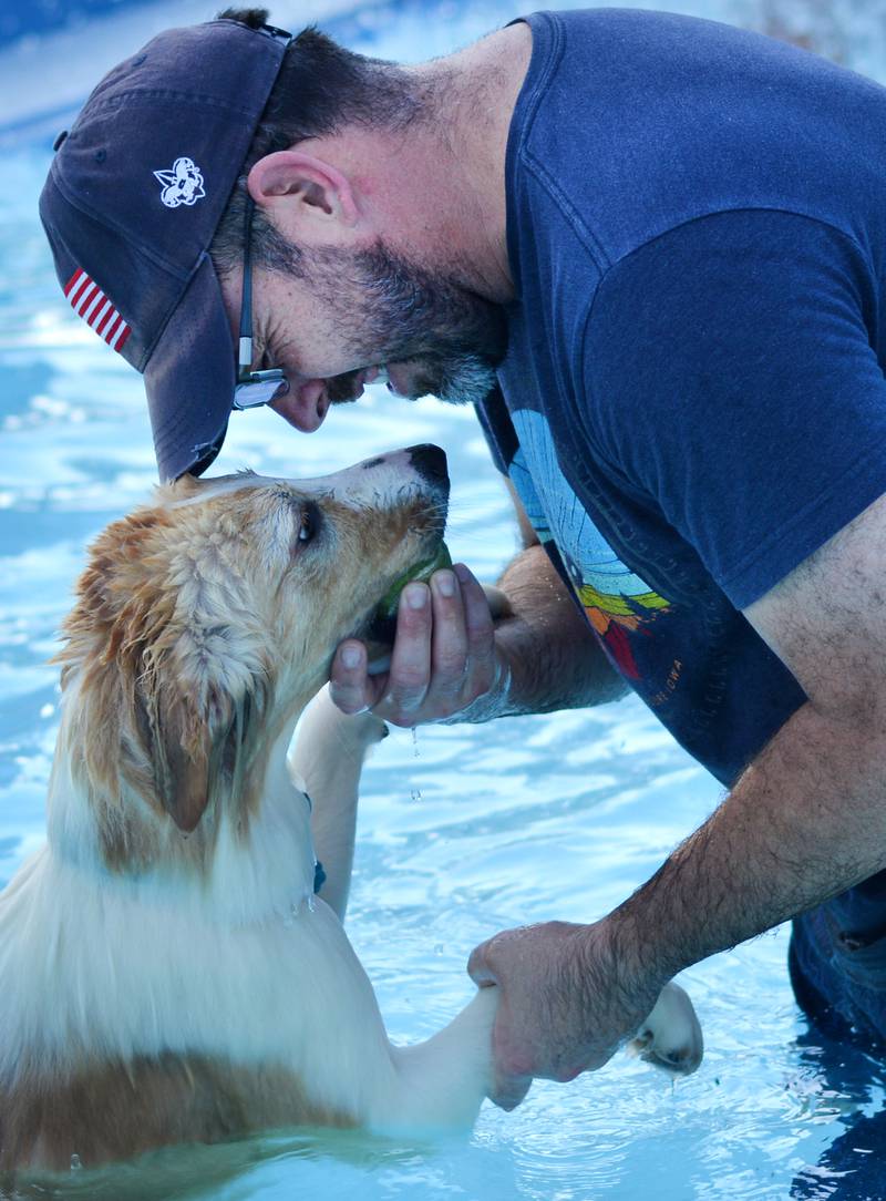 Community members bring their canine companions to the Maytag Pool Dog Swim on Sunday, Aug. 17 at Maytag Park in Newton.