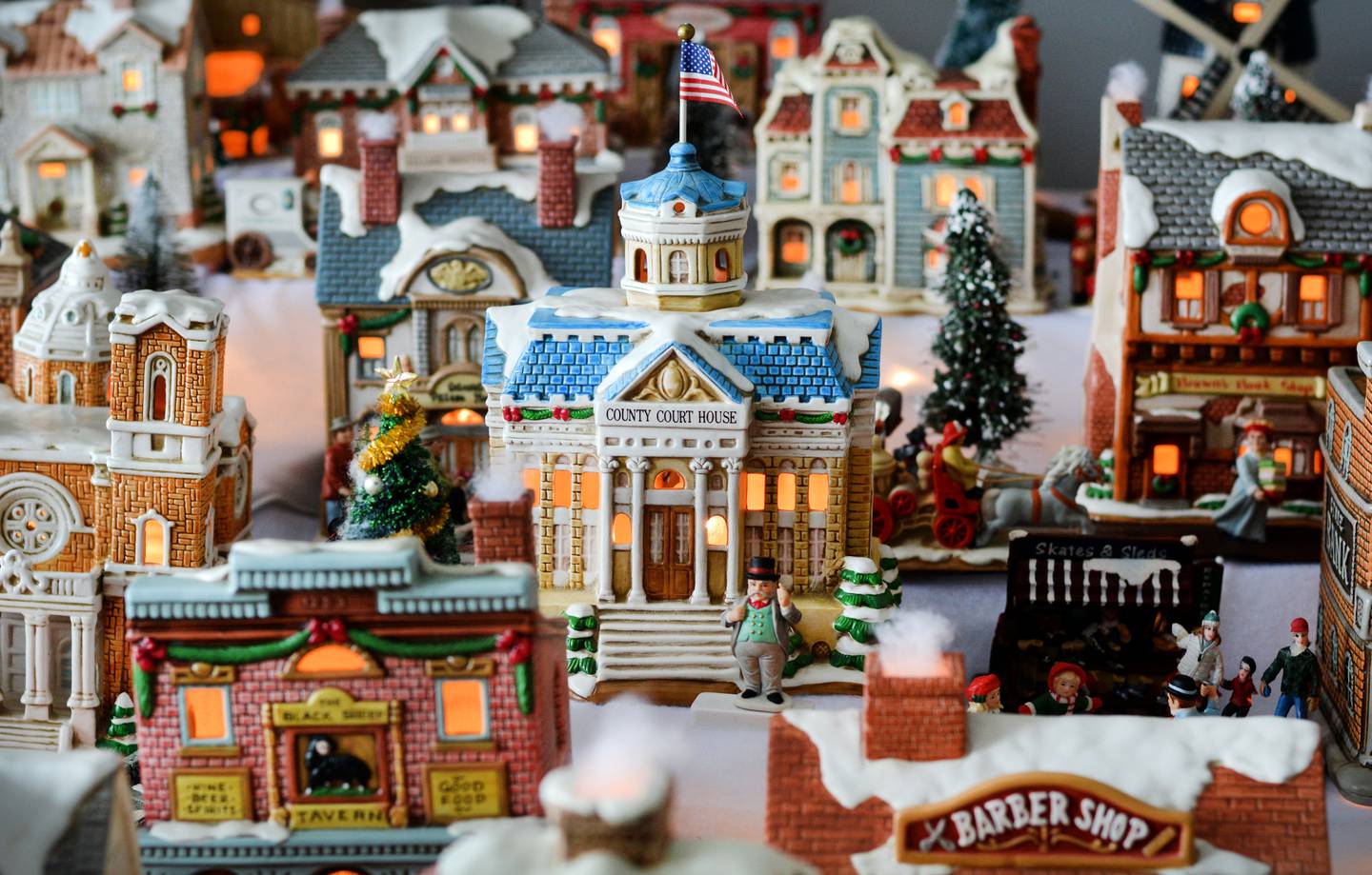 Sandi Rodgers has around 50 holiday house decorations in her collection. Her son Joe, 45, has been giving her one or two new houses every Christmas since he was 8 or 9 years old.